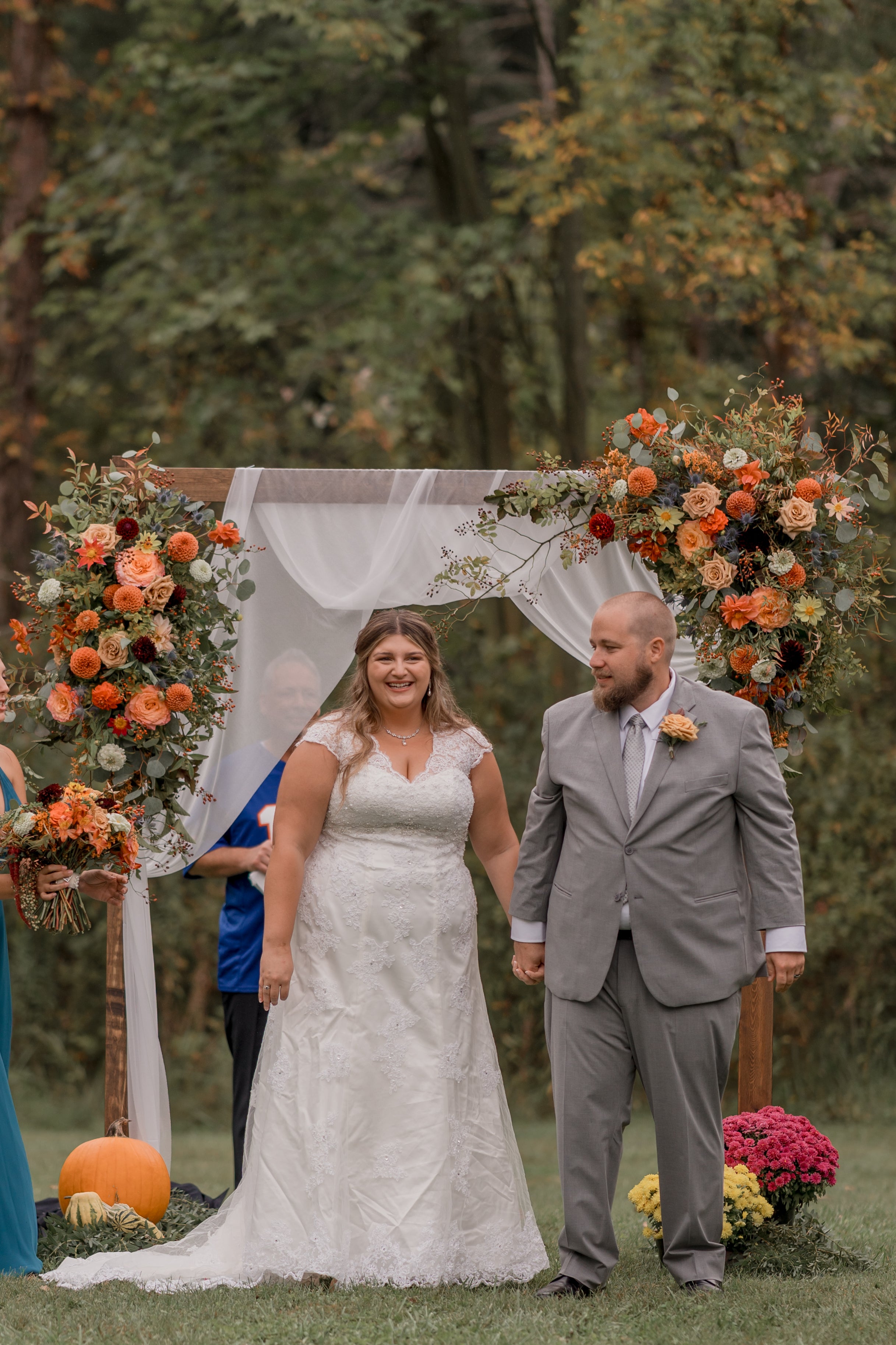 fall wedding arbor by B's Flowers LLC in Gasport, NY