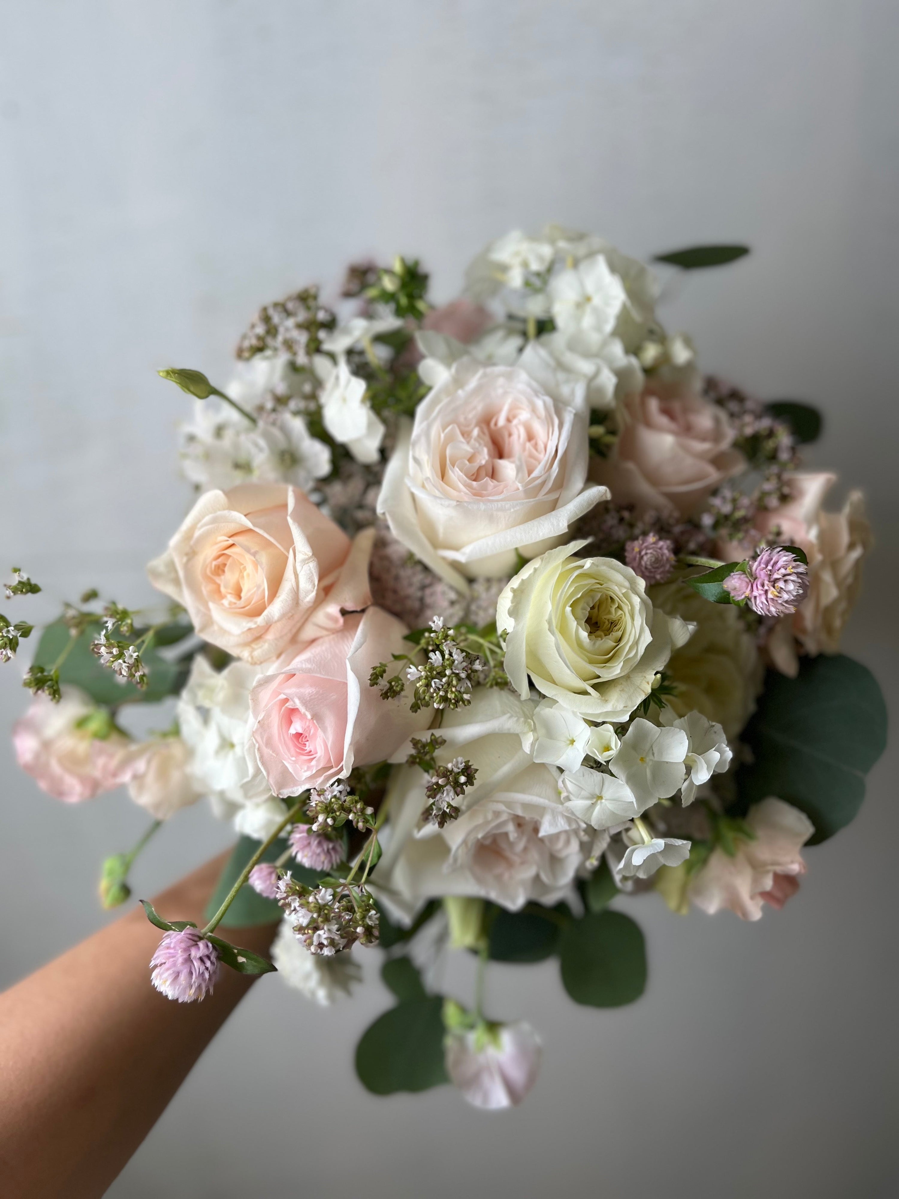blush and white wedding bouquet by B's Flowers LLC in Gasport, NY