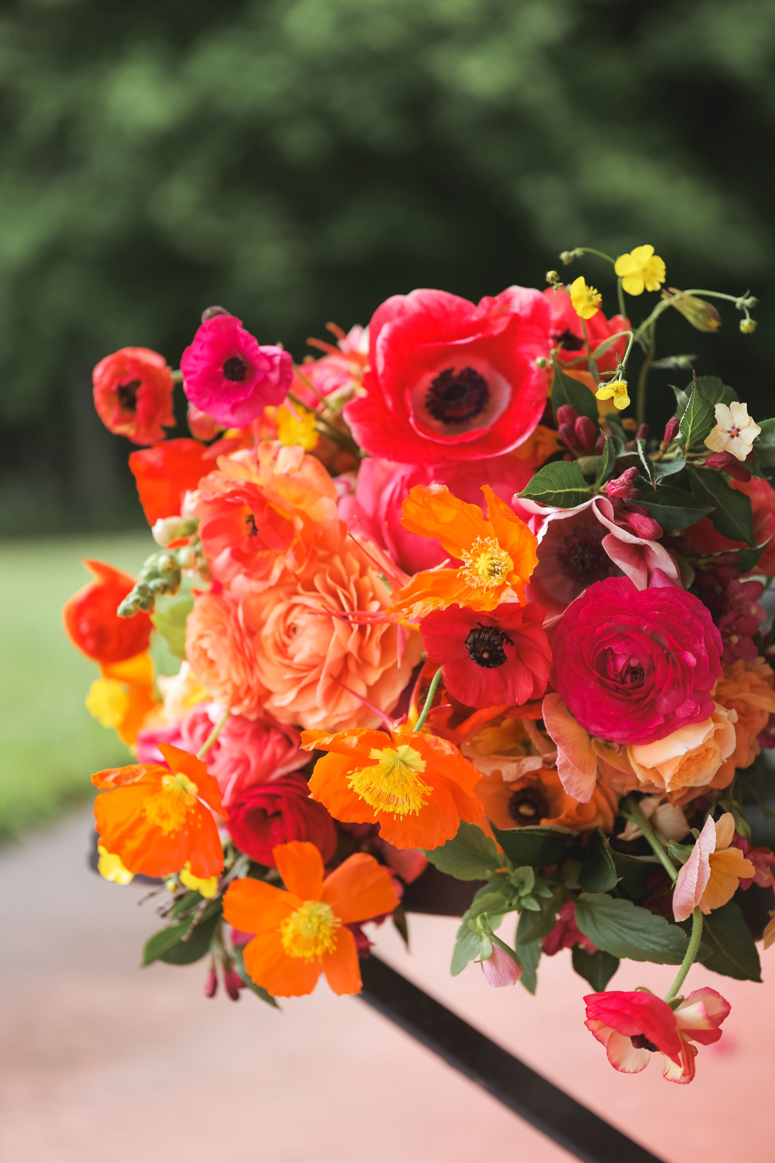 Colorful wedding bridal bouquet flowers by B's Flowers LLC in Gasport, NY